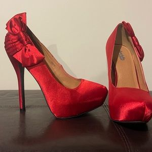 Red satin bow tie heels